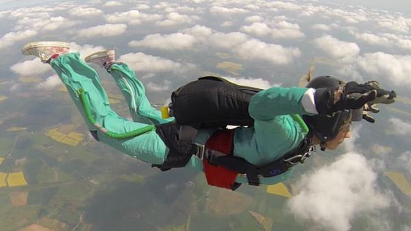 Photo of Maddy skydiving. Despite her kidney disease, she is always seeking new challenges. Photo courtesy of Andy Ford, Infinite Skydiving Solutions.